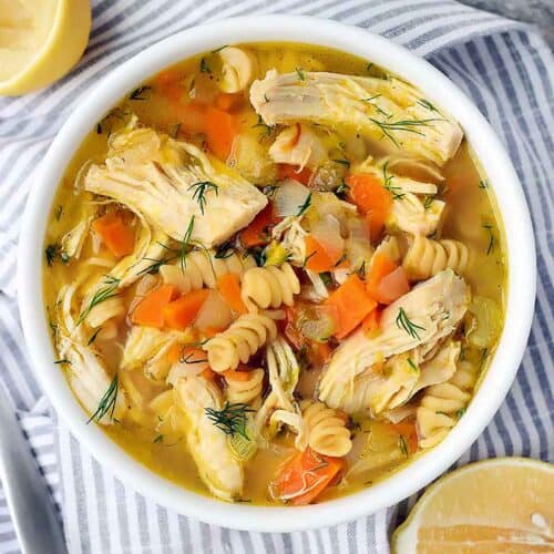 Square photo of chicken noodle soup.