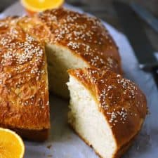 A slice taken out of a loaf of Vasilopita, or Greek New Years Bread.