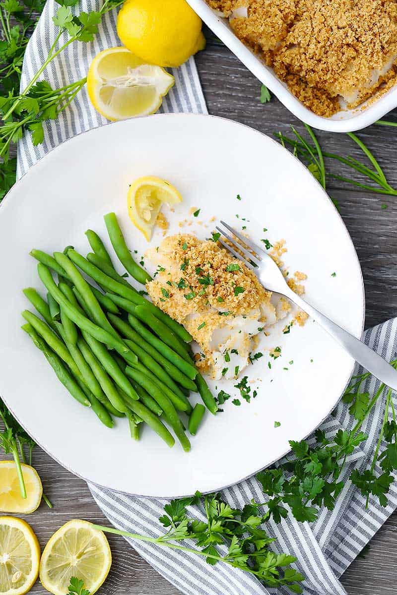 New England baked haddock is one of the most delicious fish dishes you will ever have, yet it is so simple! With only three ingredients and 5 minutes of hands-on time, you will have an elegant, crowd-pleasing meal.