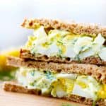 Close up egg salad sandwich photo.
