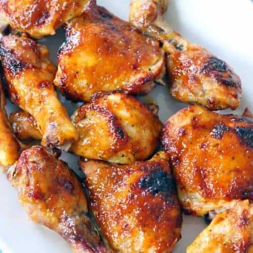 A platter of oven bbq chicken thighs and drumsticks