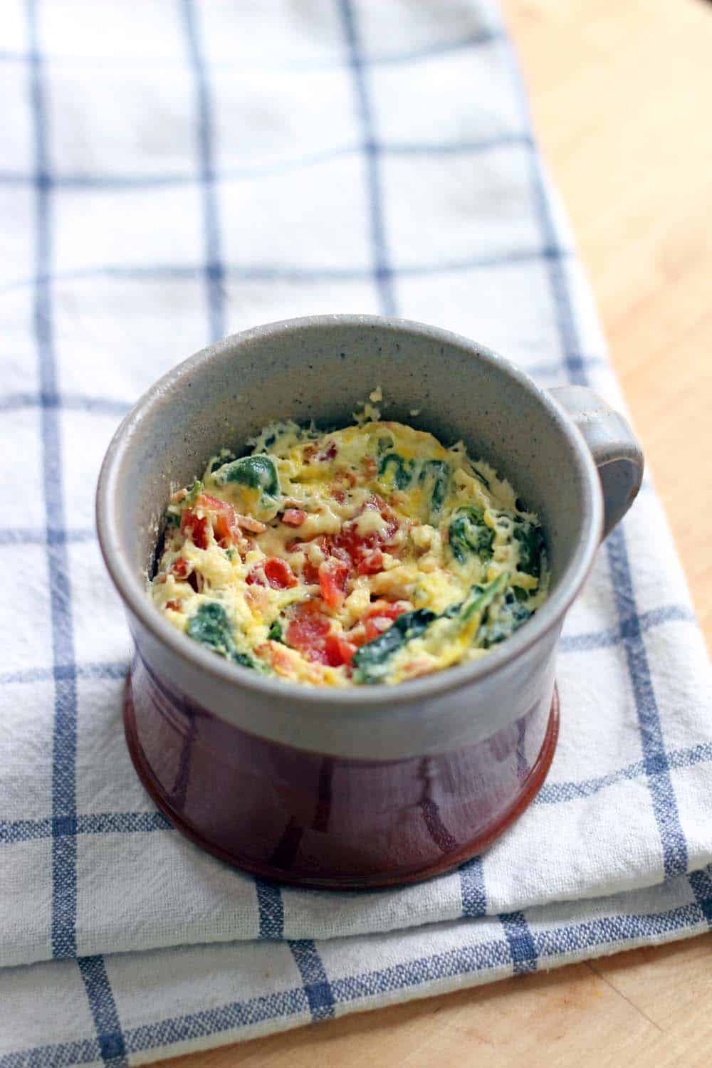 5-minute spinach and cheddar microwave quiche in a mug