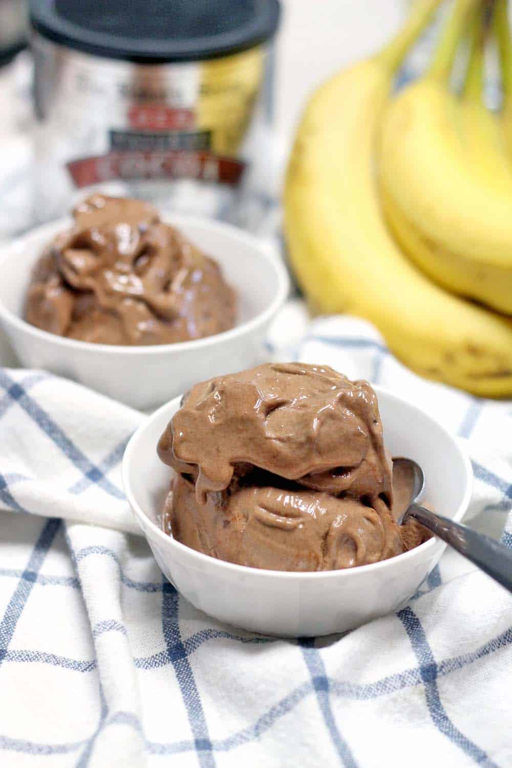 This vegan chocolate banana ice cream is made of only TWO ingredients and is an awesome, healthy substitute for traditional ice cream!