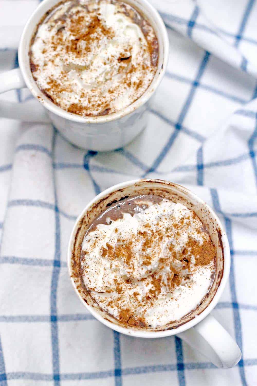 Spicy Mexican Maple and Molasses Hot Chocolate | This hot chocolate has no refined sugar and is smooth, warm, slightly spicy, and decadent with a pinch of cinnamon and cayenne pepper. Sweetened with molasses and maple syrup. SO COZY!