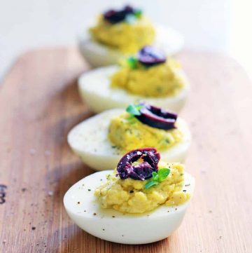 Olive oil and red wine vinegar are used in place of mayo and mustard with fresh oregano in this Greek Deviled Egg recipe. Paleo and Whole30 compliant!