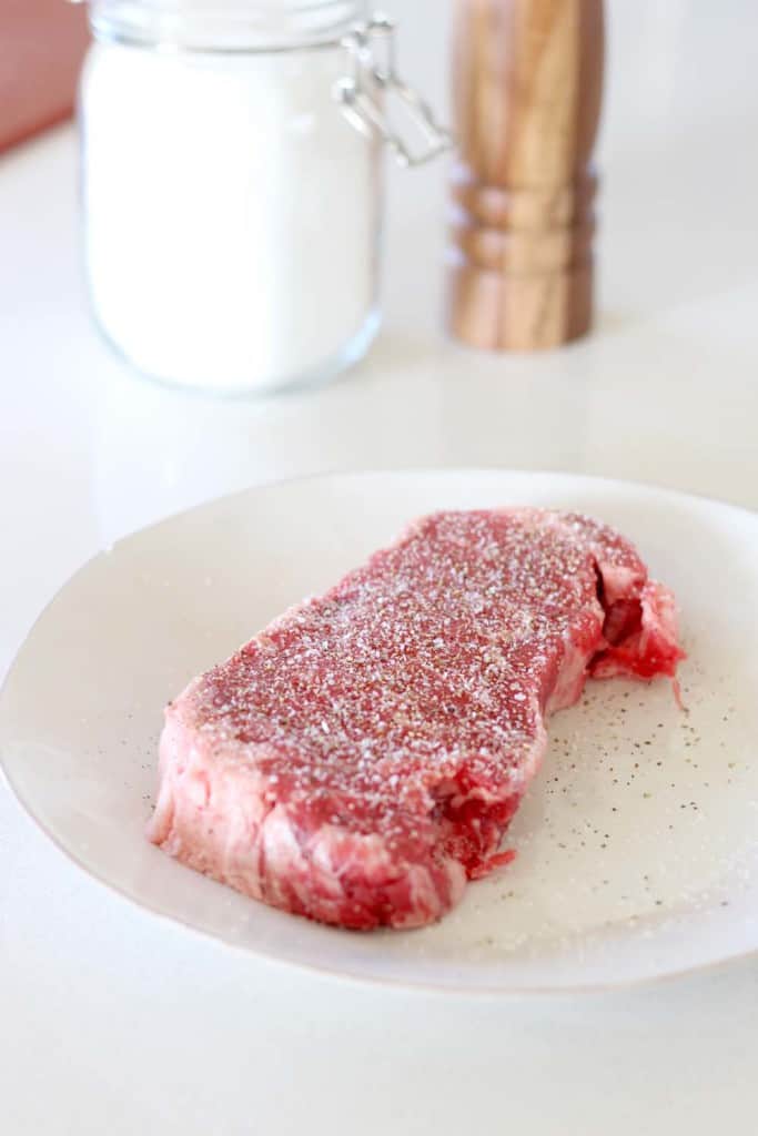 Make the most PERFECT tender, melt-in-your-mouth steak with these 9 easy steps/tricks, with a rich browned butter pan sauce drizzled on top. Paleo and Whole30 approved!