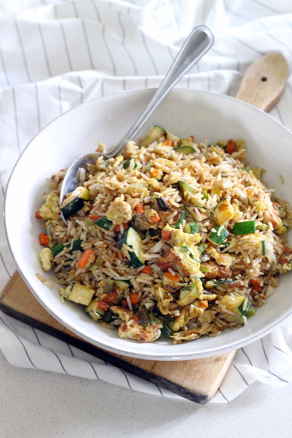 Ten minutes and six ingredients is all you need for this fresh, delicious veggie fried rice that's MUCH healthier than take-out!