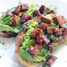 AVOCADO TOAST IS AMAZING!!! This version has spicy and smoky chorizo on top, and is seasoned with fresh lime juice, garlic, and cilantro. Good for breakfast, lunch, or dinner, and only takes FIVE MINUTES to make!