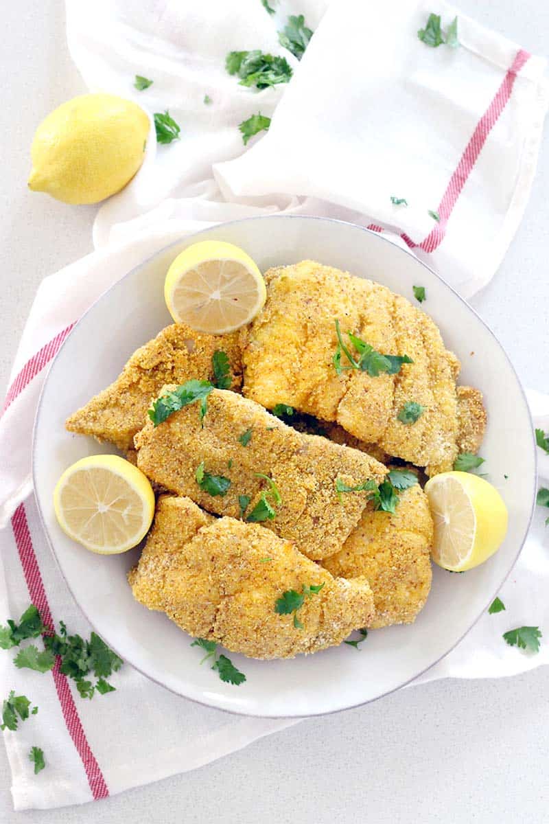 All you need are four ingredients and 20 minutes for the easiest southern style oven fried catfish ever! Slightly spicy, super crispy on the outside, and tender and flaky on the inside. Gluten free, healthy, and great on its own or in a sandwich!