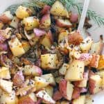 These Roasted Potatoes and Onions are PERFECT. They're mixed with onions that caramelize, rosemary, and whole grain mustard that adds a subtle kick. The perfect side for anything from a casual weeknight dinner to Thanksgiving!
