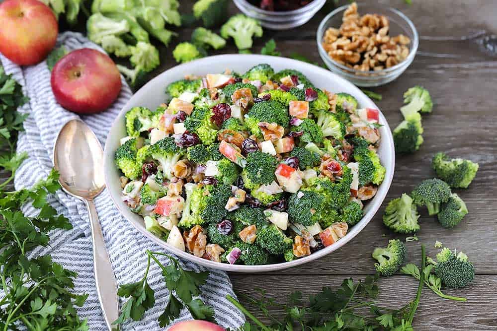 Horizontal photo of a bowl of broccoli salad.