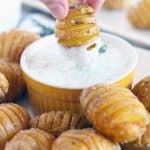 Perfect as an appetizer, these Mini Hasselback Potatoes with Creamy Dill Dip are dunkable and delicious! Gluten free, vegetarian, and perfect for the holidays.