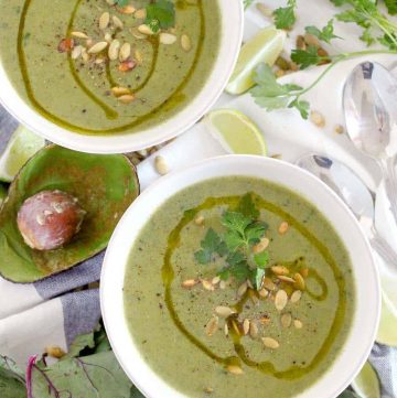 This Broccoli Avocado Soup with Beet Greens is creamy, vegan, and SUPER healthy. I love this soup as a detox after over indulging! You can use spinach, kale, or other greens as well. | www.bowlofdelicious.com