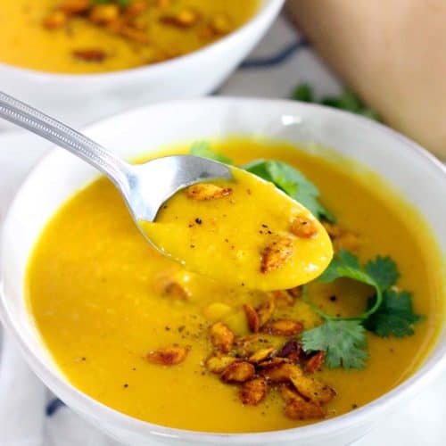 This Ginger Turmeric Butternut Squash Soup is full of healing, healthy ingredients. It's warm, deliciously bright, vegan, low carb, Paleo, and Whole30 compliant!