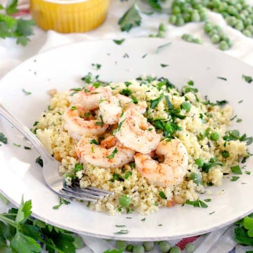 This Shrimp and Couscous with Peas and Mint recipe is a simple, healthy, 20 minute meal that's a cinch to make and perfect for spring!