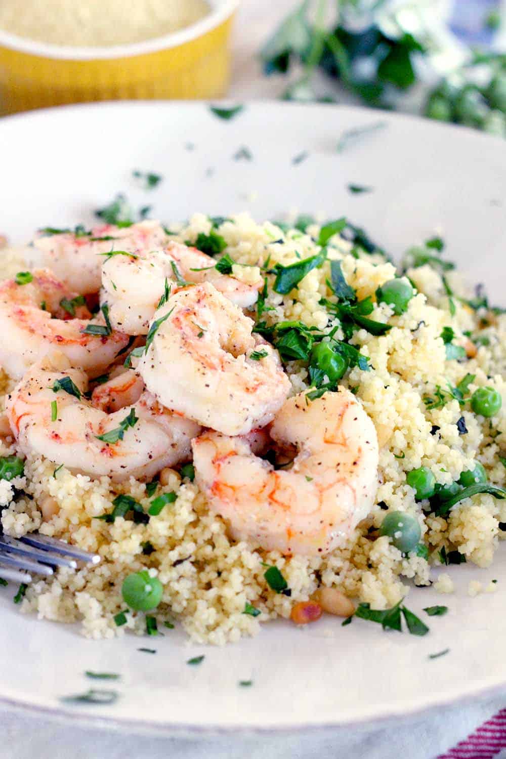 This Shrimp and Couscous with Peas and Mint recipe is a simple, healthy, 20 minute meal that's a cinch to make and perfect for spring!