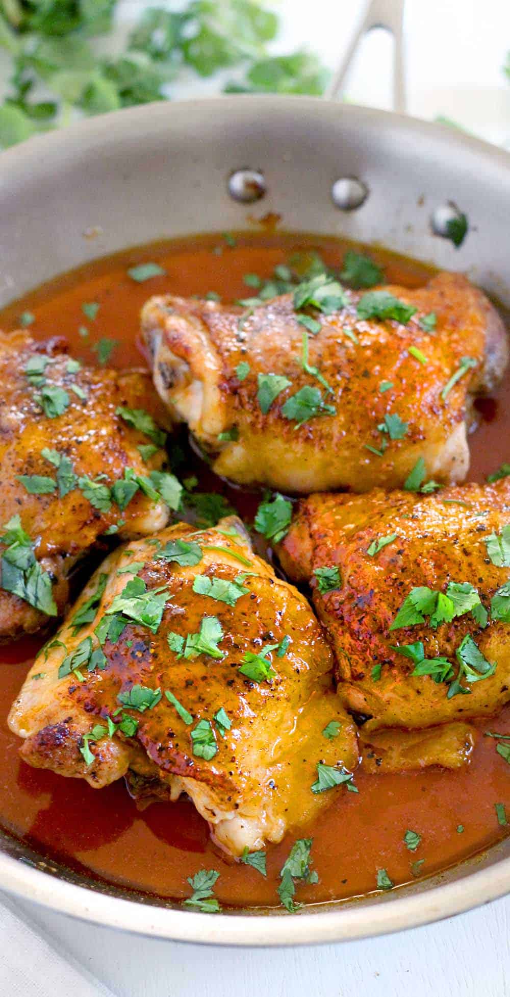 This sweet and spicy recipe for honey buffalo chicken thighs features crispy skin and only five ingredients. Make this low-carb, budget-friendly, gluten-free meal next time you are craving buffalo flavor!