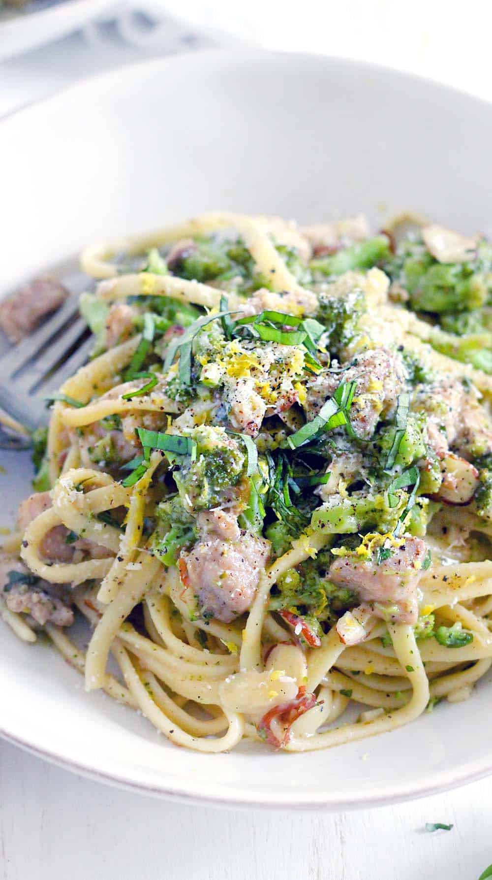 This chicken and broccoli linguine with lemon butter basil sauce recipe is creamy without any milk or cream. Full of bright, fresh flavor and packed with good for you broccoli.