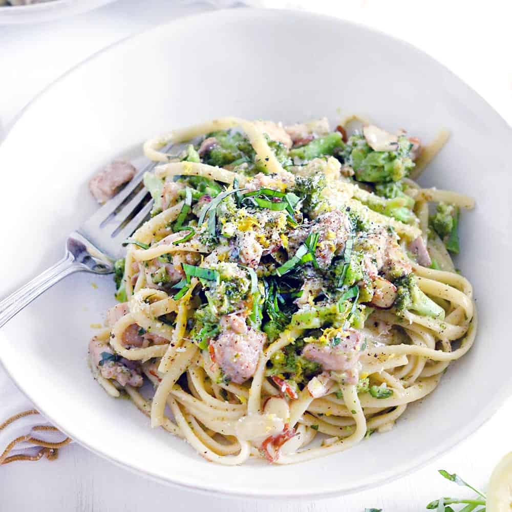 This chicken and broccoli linguine with lemon butter basil sauce recipe is creamy without any milk or cream. Full of bright, fresh flavor and packed with good for you broccoli.