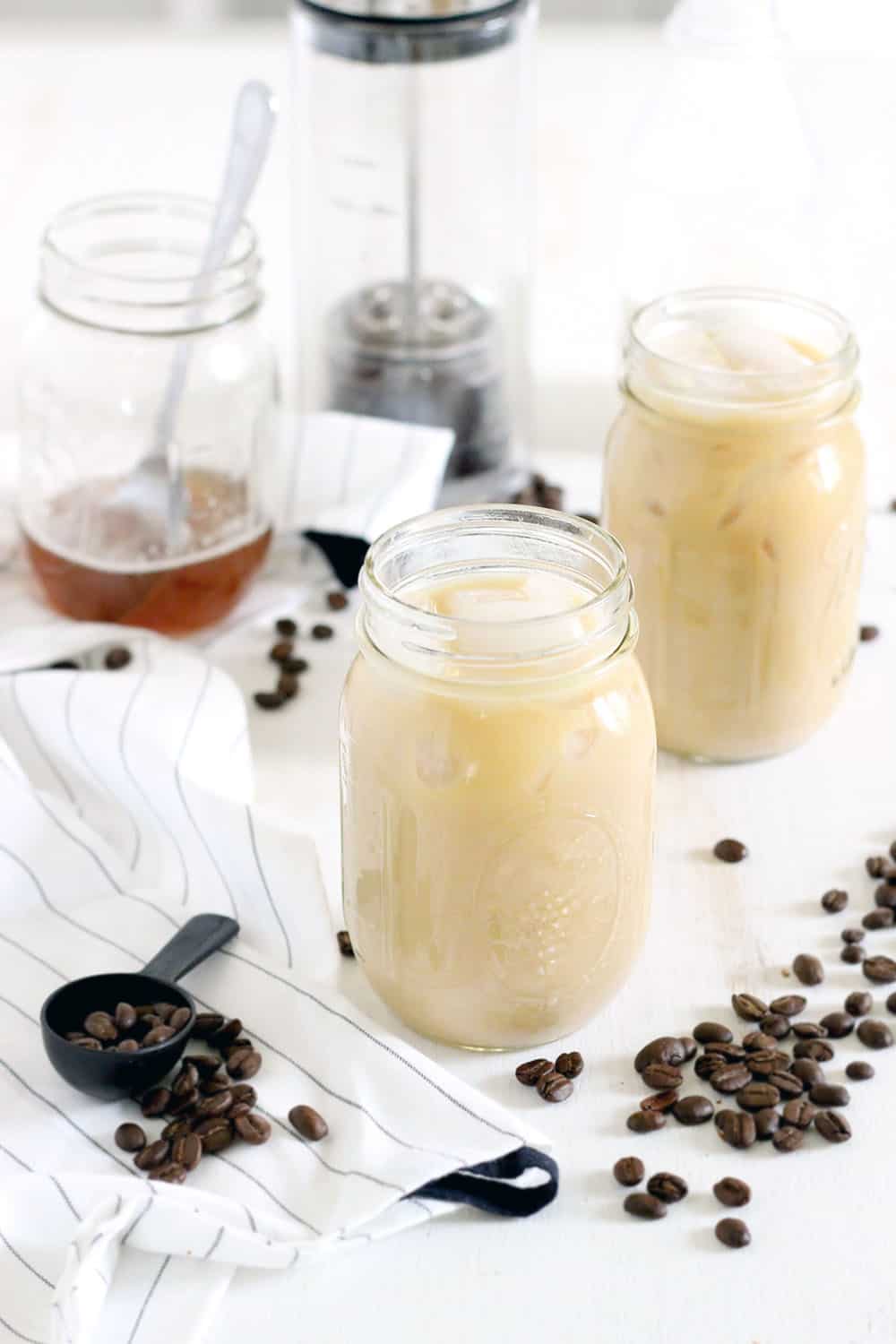 Iced Honey Vanilla Latte | Strong coffee is mixed with a honey vanilla simple syrup and whole milk for a refreshing, refined sugar free beverage | www.bowlofdelicious.com