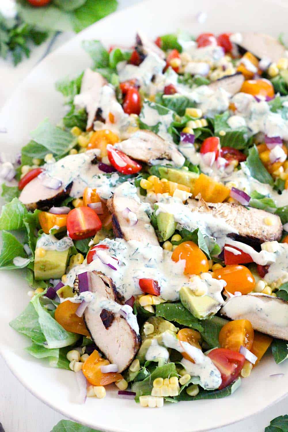 This lighter version of Cobb Salad with Buttermilk Ranch Dressing is PACKED with flavor. It's a healthy and hearty gluten-free recipe, and it won't weigh you down.