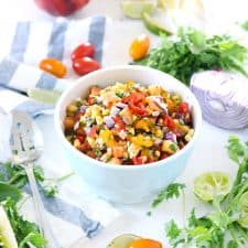 Full of fresh summer ingredients, this mild, simple summer peach salsa is great on chips, on tacos, on fish... it's slightly sweet, tangy, and pairs well with spicy, warm flavors. It's healthy, gluten-free, vegan, raw, and low-fat, and it's mild flavor makes it kid friendly.