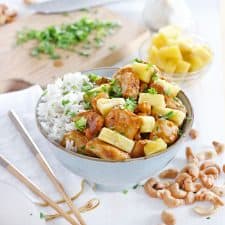 This skinny pineapple chicken with cashews is a healthy, low-fat stir fry you can make in 20 minutes! Naturally sweetened from fresh pineapple in a thick and delicious sauce brown sauce.