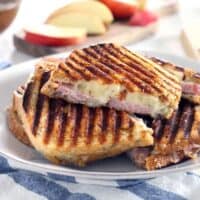 These ham, apple, and swiss panini are the perfect fall sandwich! Use up leftover ham from the holidays and take advantage of the crisp apples the season has to offer.