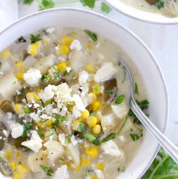 This mild green chile and corn chowder is thick and creamy, packed with sweet corn and mild fire-roasted green chiles. It's a gluten-free, vegetarian, hearty soup perfect for the end of summer!