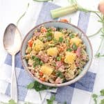 This Pineapple and Ham Fried Rice is a great recipe to use up leftover holiday ham! It only takes 15 minutes, one-pot, and it's easily made gluten-free. #FriedRice #LeftoverHamRecipes #Pineapple #QuickandEasy #15MinuteMeals #GlutenFree