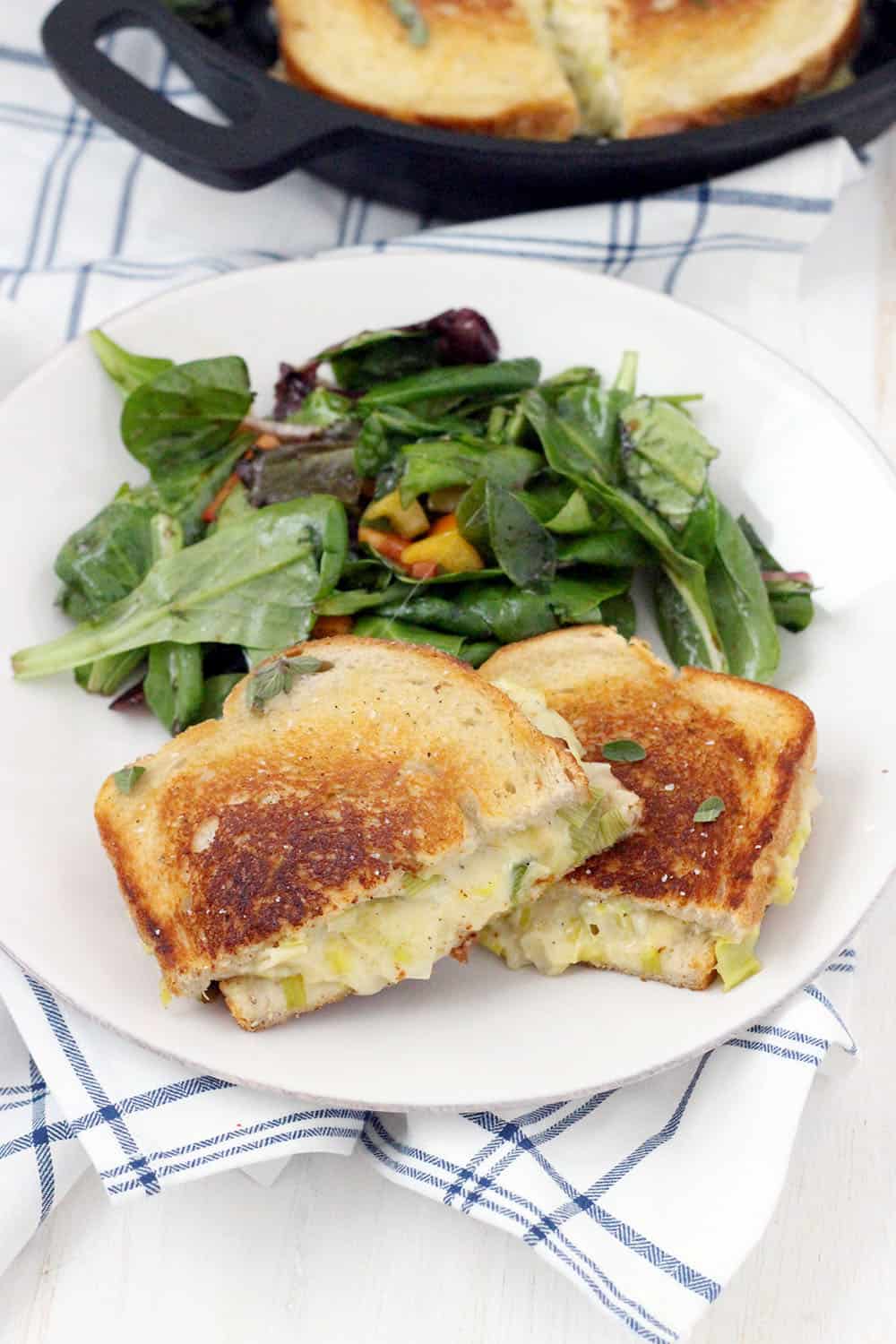 This Leek and Gruyere Grilled Cheese recipe is rich and buttery. Every bite is infused with perfectly melted cheese and that subtle, savory, onion flavor leeks are known for. The perfect easy weeknight dinner with a simple salad or light soup!
