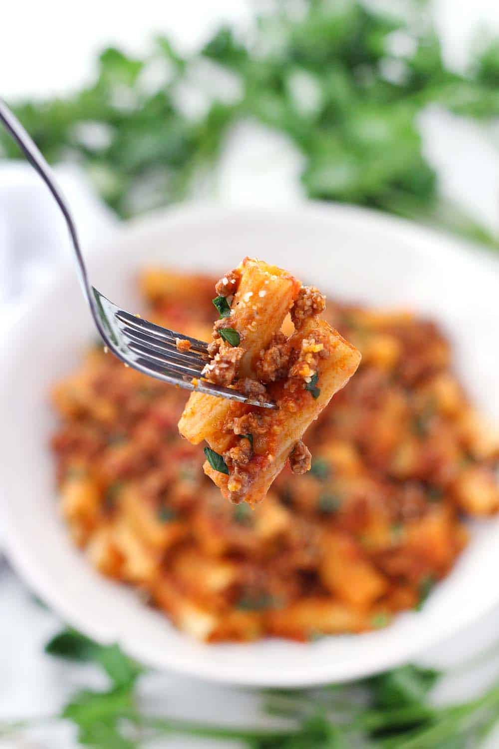 With a few tricks and only five ingredients, you can make the BEST Pasta with Bolognese sauce at home- the kind where the sauce clings to every piece of pasta and has the most authentic Italian taste!