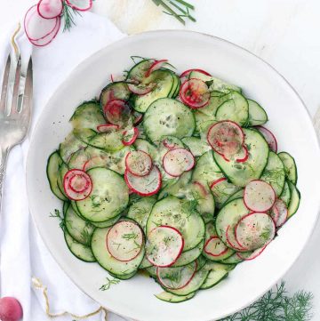 This Cucumber and Radish Salad with Dill is dressed in a sweet and tangy red wine vinaigrette and is addicting! A perfect low-carb, refreshing side that can easily be made ahead of time. 