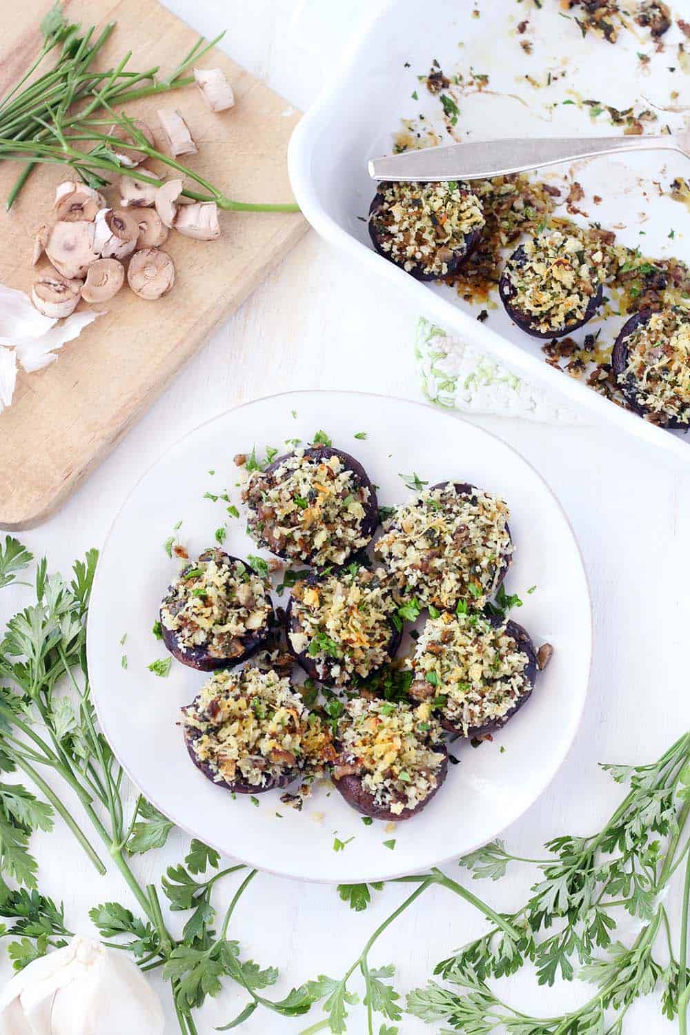 These Italian Vegetarian Stuffed Mushrooms are a great make-ahead recipe for dinner or an appetizer! They're packed with flavor from the fresh herbs, shallots, garlic, and parmesan cheese. 