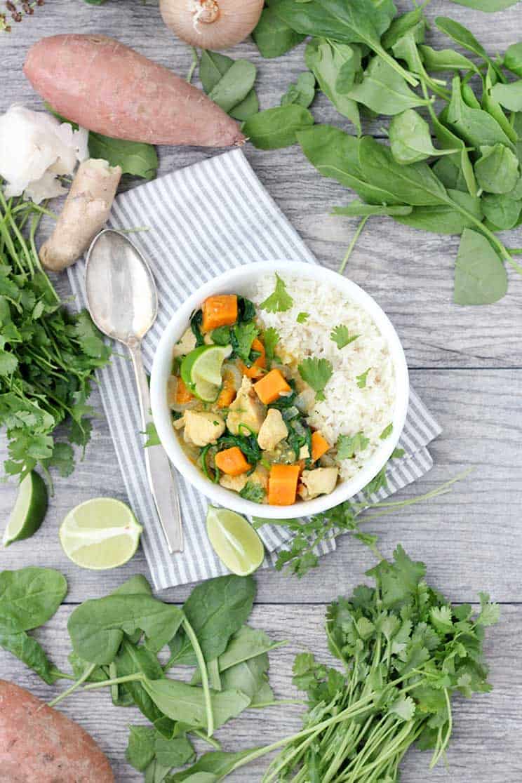 Green Chicken Curry with Sweet Potatoes and Spinach is such an easy, flavor-packed, veggie-packed recipe! This version is dairy free, gluten free, and paleo/whole30 compliant.