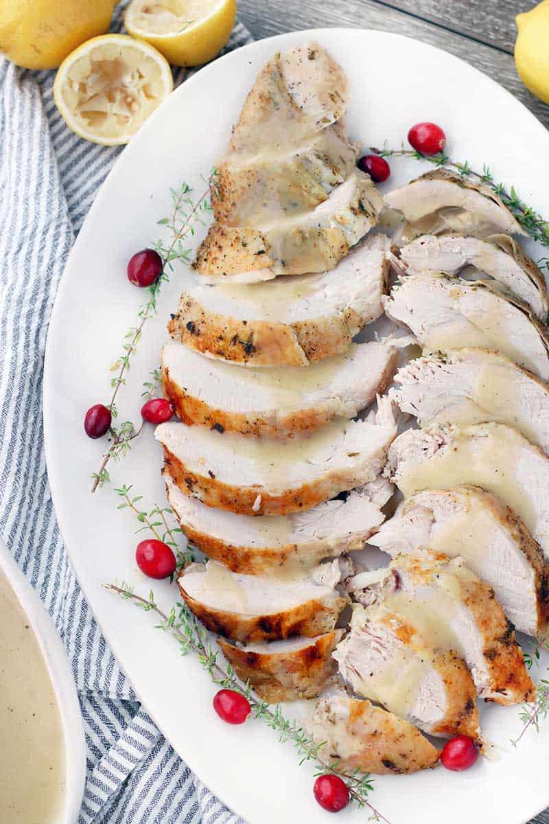 This Instant Pot Turkey Breast with Lemon and Thyme is a Thanksgiving game changer! Cook the whole thing in under an hour for juicy, tender bone-in, skin-on turkey breast.