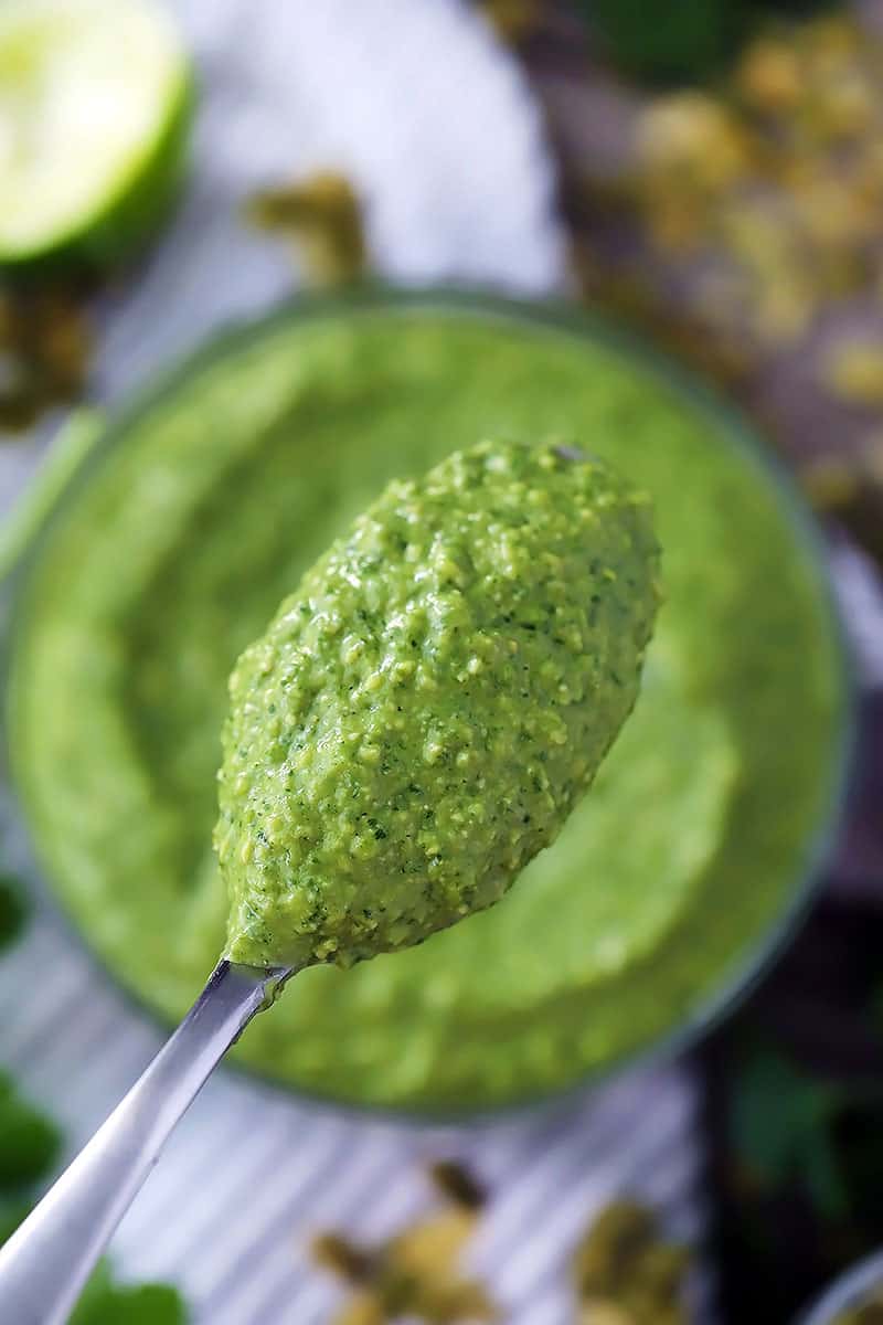 A spoonful of avocado sauce.