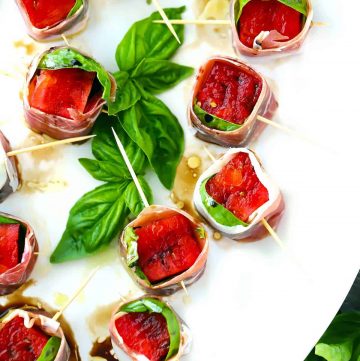 An overhead shot of prosciutto and watermelon skewers.