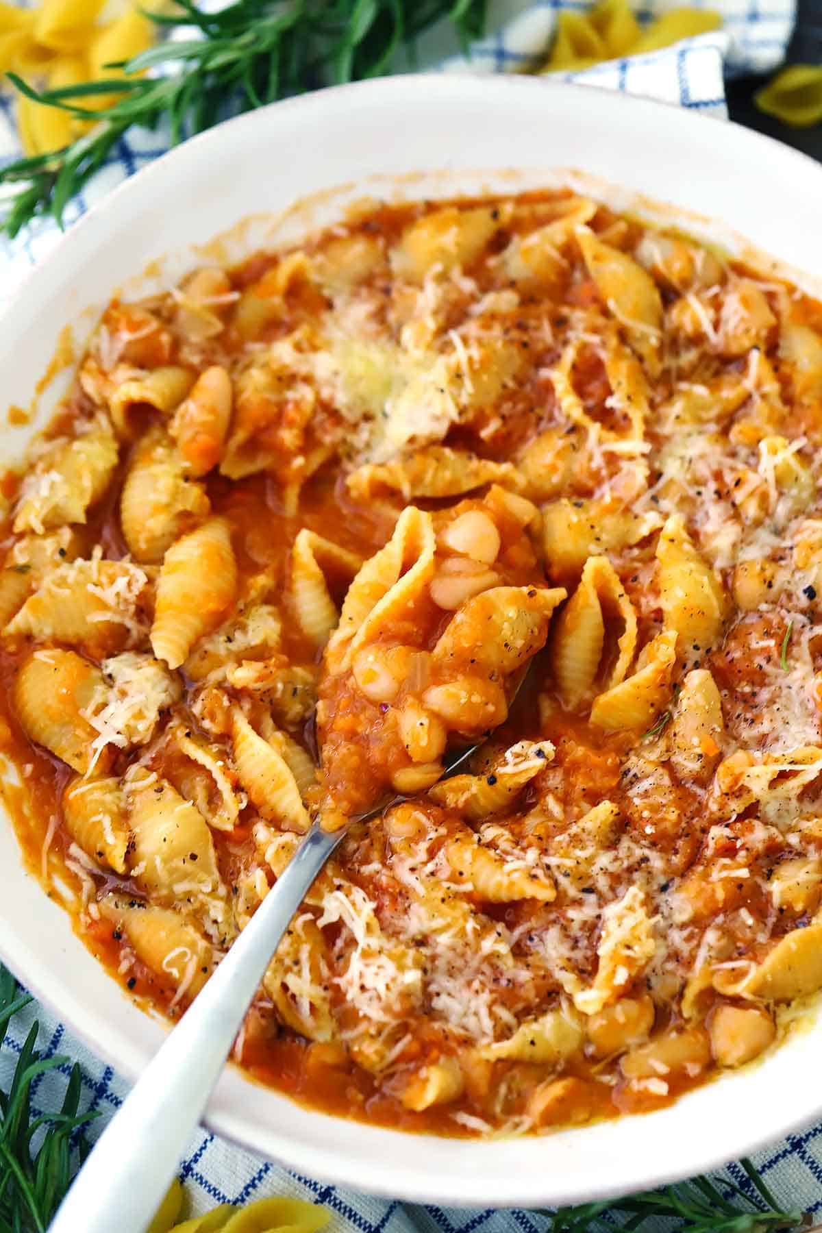 A bowl of pasta e fagioli (Italian Pasta and Beans) with a spoon