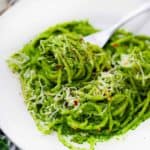 square image of spaghetti with kale pesto.