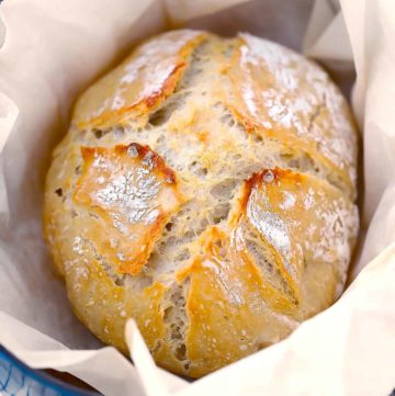 Square image of no knead dutch oven artisan bread
