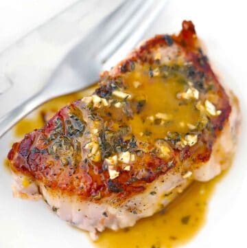 Square photo of oven baked pork chops.