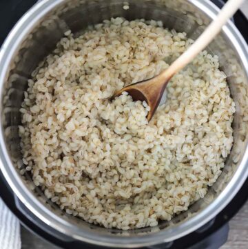 Square photo of cooked barley in an instant pot.
