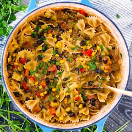 Square photo of one pot cheesy taco pasta.