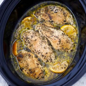 Square photo of slow cooker chicken breasts.