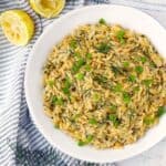 Square photo of overhead shot of orzo pilaf.