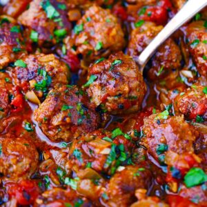 Square photos of a spoon scooping out two lamb meatballs in a tomato sauce.