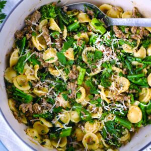 Square photo of One Pot Orecchiette with Sausage and Broccoli in a Dutch Oven