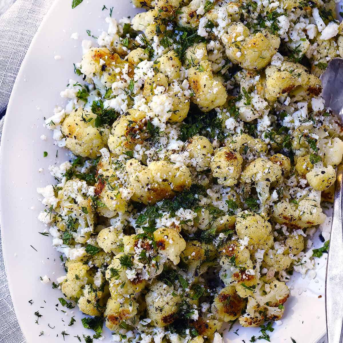 Greek Roasted Cauliflower with Feta and Herbs - Bowl of Delicious