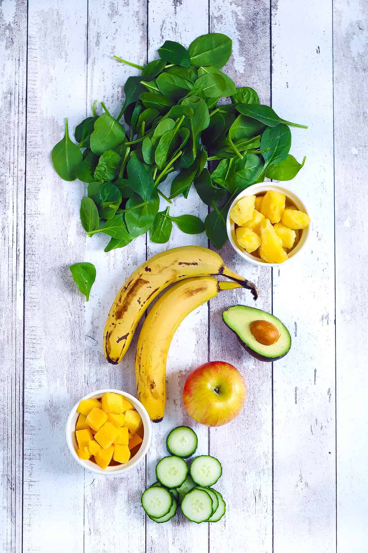 Flatlay of ingredients for a green smoothie.